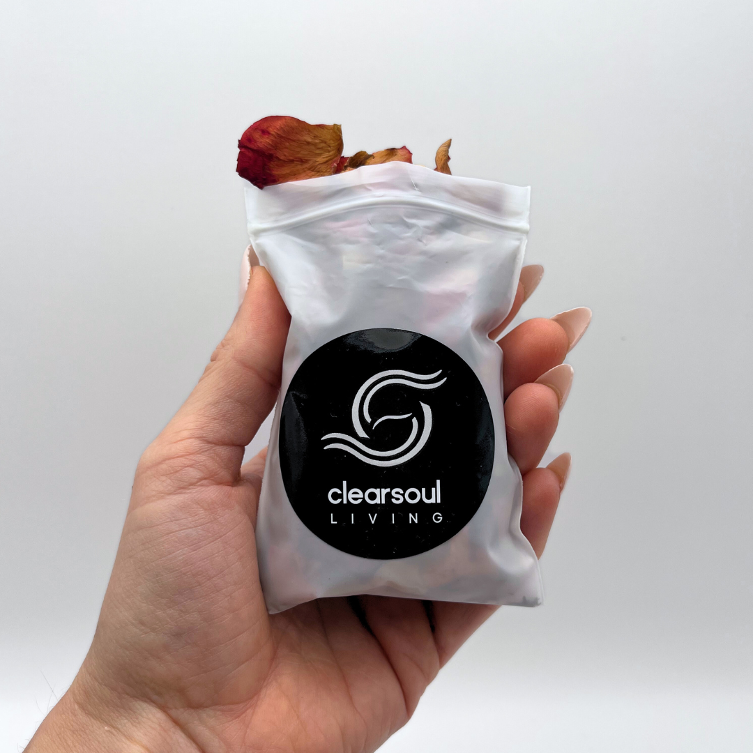 Clear Soul Living pouch filled with dried rose petals, known for their loving energy and connection to the heart chakra.