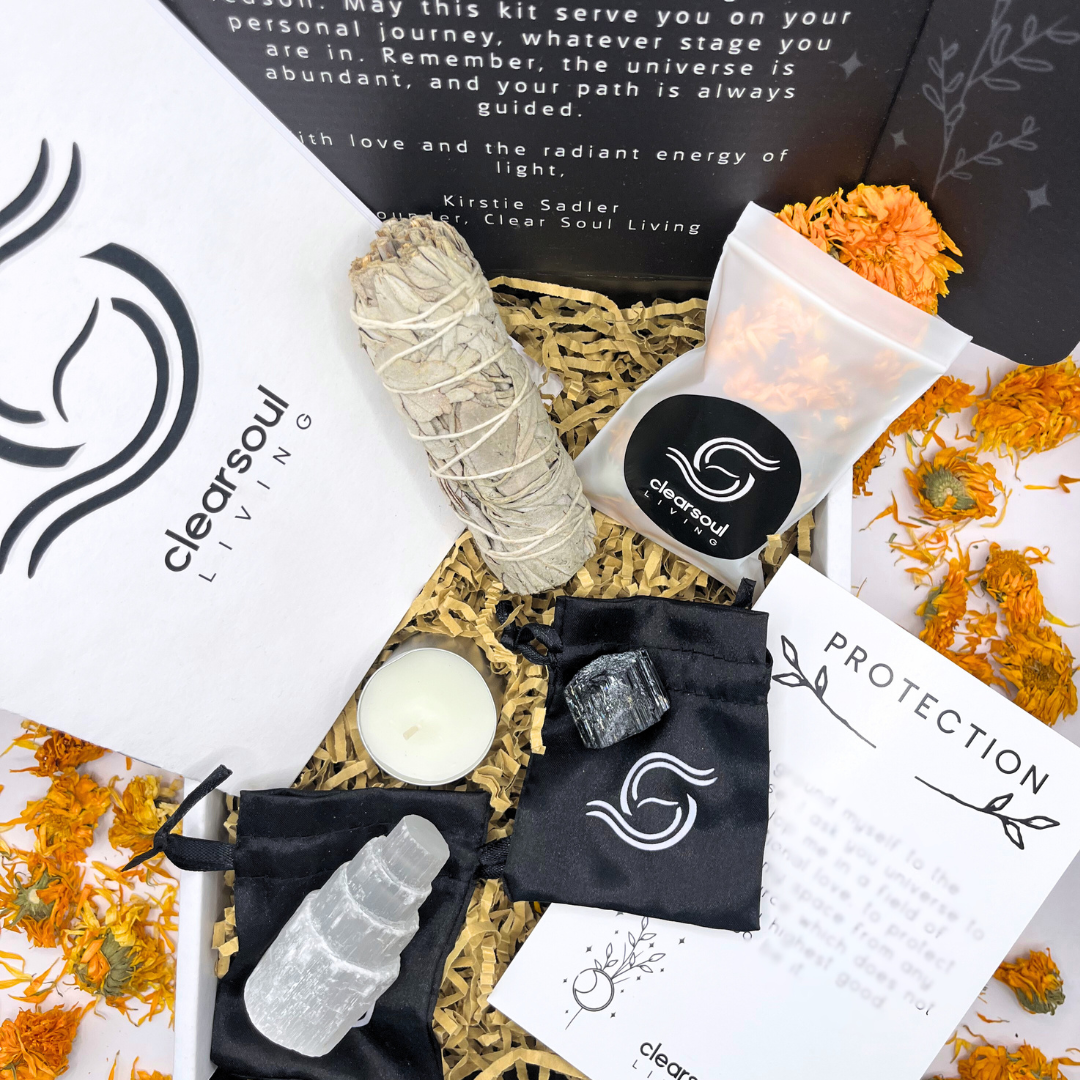 Protection Kit featuring Black Tourmaline, White Sage, Selenite Crystal Tower and affirmation card. Designed to cleanse energy and protect your space. Clear Soul Living packaging.